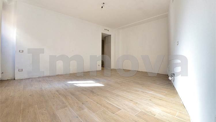 Soggiorno con angolo cottura